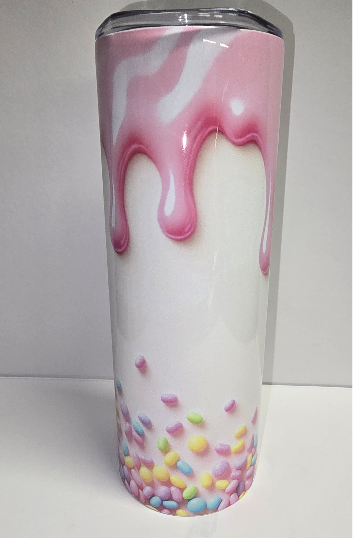 Pink frosting drip and pastel sprinkles birthday cake sublimation tumbler