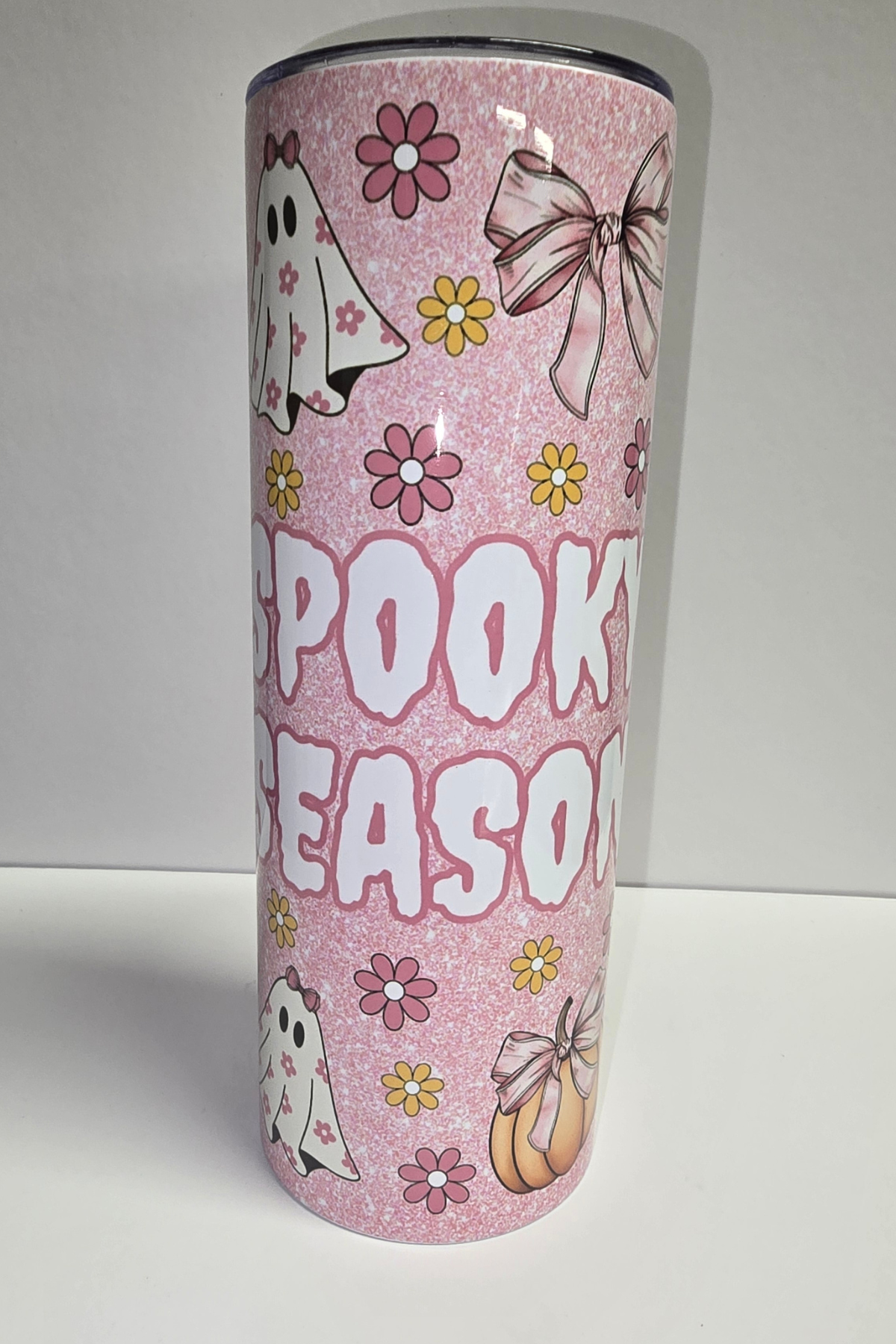 Spooky Season pink glitter Halloween sublimation tumbler with floral ghosts and daisies